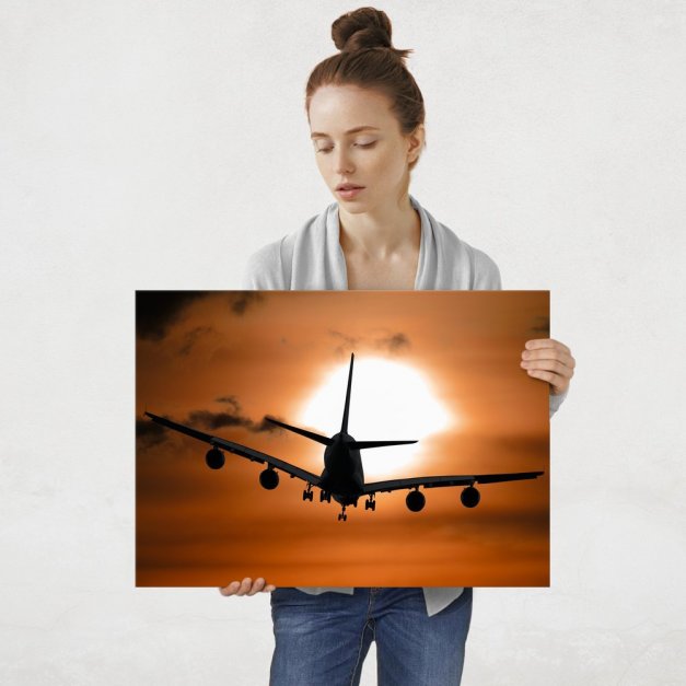 Plakat metalowy samolot na tle zachodzie słońca L