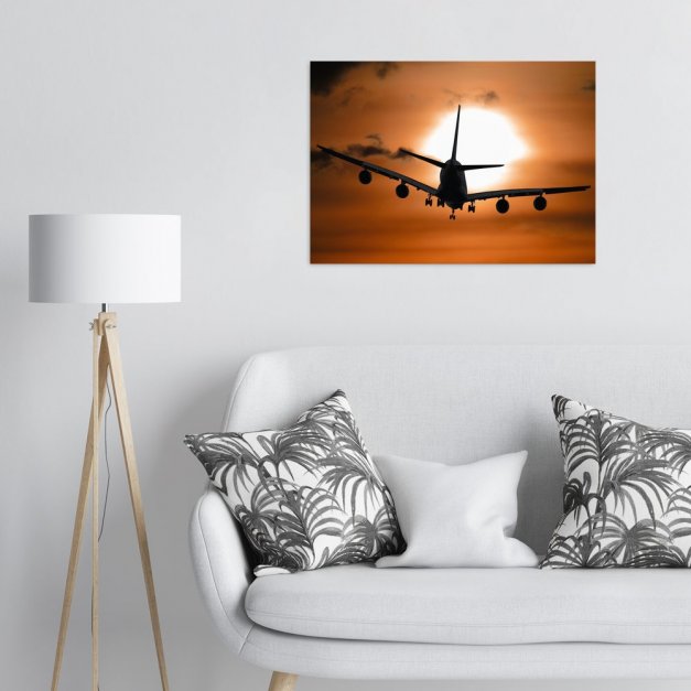 Plakat metalowy samolot na tle zachodzie słońca L